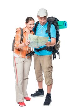 Happy woman and surprised man with a map with backpacks on a white background