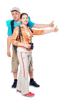 Couple hikers with backpacks hitchhiking, shooting on white background