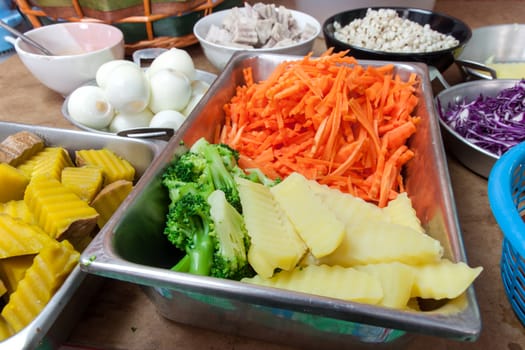 boiled vegetables many thing in plate for diet of vegetables. wait for the kitchen cooking