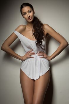 attractive  slim girl in white top