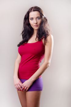 attractive brunette girl in red shirt