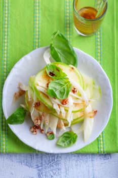 Fresh Fennel and apple salad on a white plate