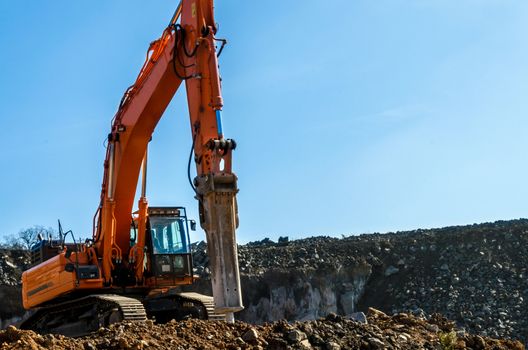 the excavator in a mine in a day's work