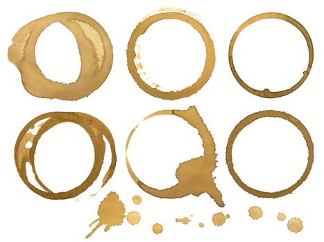 Photo of six coffee stains on white background.