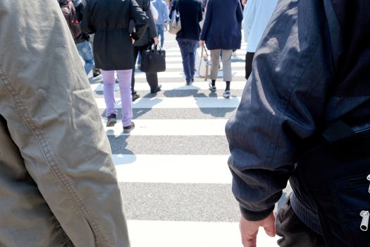 Pedestrians cross at Shibuya Crossing,Tokyo Japan