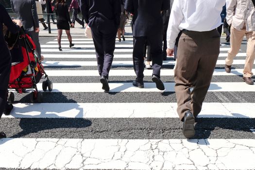 Pedestrians cross at Shibuya Crossing,Tokyo Japan