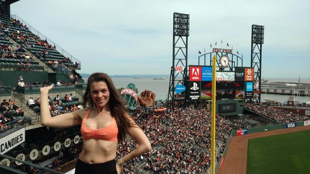 Alicia Arden the "Hoarding: Buried Alive" actress spends Easter-Eve at AT&T Park for the Giants/Rockies Game wearing an orange bikini with the price tage still attched, AT&T Park, San Francisco, CA 04-15-17