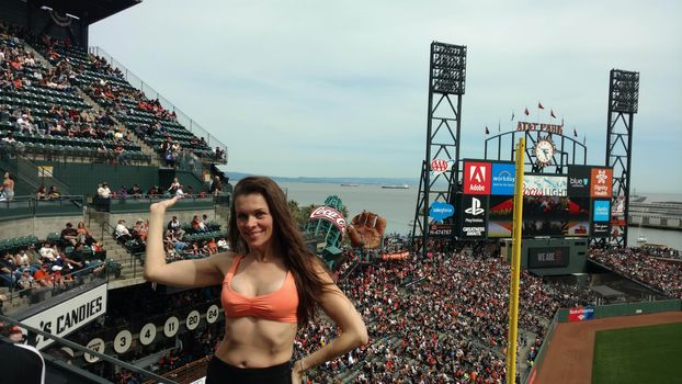Alicia Arden the "Hoarding: Buried Alive" actress spends Easter-Eve at AT&T Park for the Giants/Rockies Game wearing an orange bikini with the price tage still attched, AT&T Park, San Francisco, CA 04-15-17