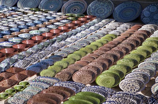 Traditional ceramic dishware in a street market, Uzbekistan