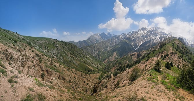 Panorama of Chimgan mountains, Uzbekistan, on a sunny day