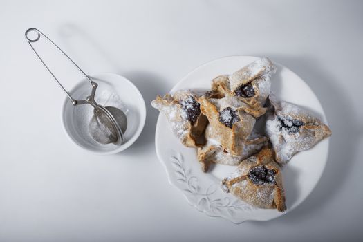 Jewish Pastry Hamantaschen on a table for Purim Holiday