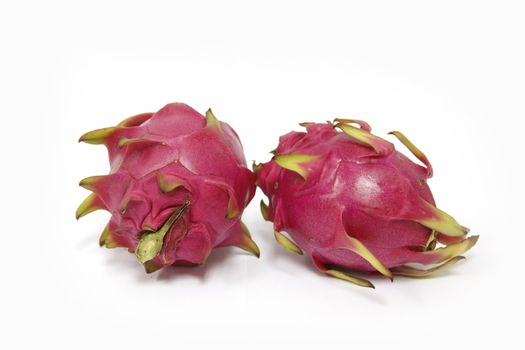 Purple dragon fruit on white background