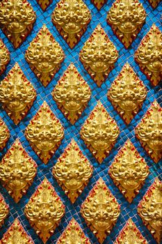 Thai pattern inside Thai temple, giant patter on blue glass background