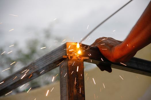 welding steel with spread spark and lighting around