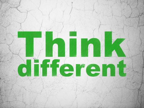Learning concept: Green Think Different on textured concrete wall background