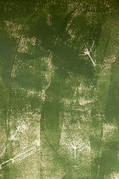 Texture and background of wite bare concrete wall painted green color.