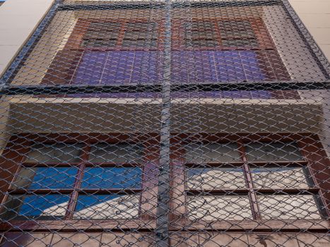 The house installs a metal mesh to protect the birds from nesting