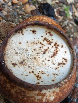 A rusty can on the floor