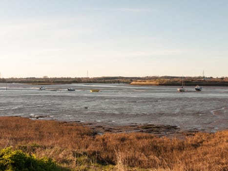 A wonderful shot of the river and its bank with the tide out on a clear day