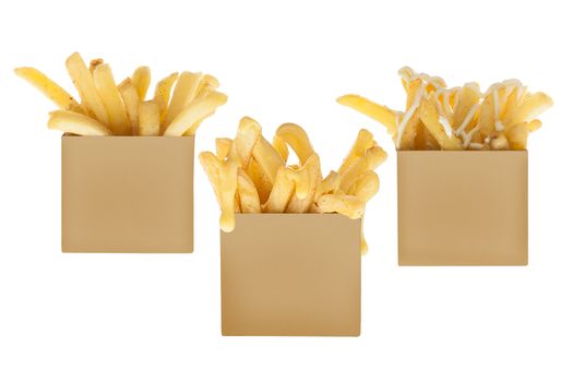Take away boxes of french fries with plain, cheese and may sauces dips