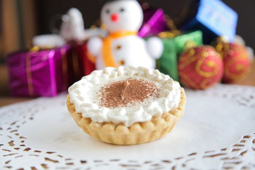 Delicious pie decorated with christmas new year setting

