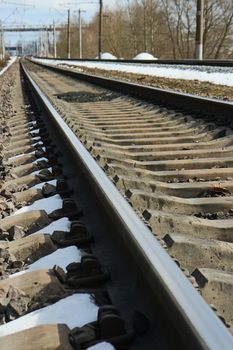 rails of railway go into distance