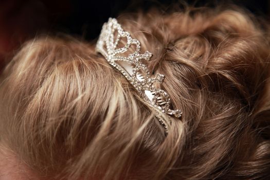Wedding tiara in bride hair close-up