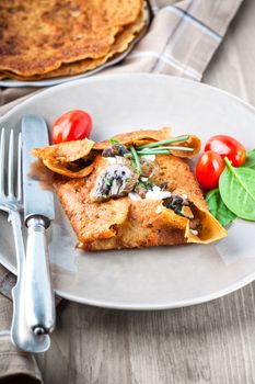 Homemade french buckwheat galette on the table 