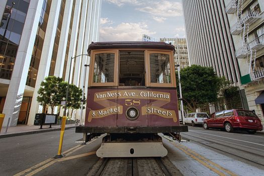 view of historical cable car on famous van ness ave  in san francisco
