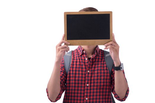 Asian male student covering his face with a chalkboard
