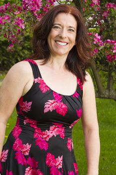 Woman in her forties wearing a summer dress