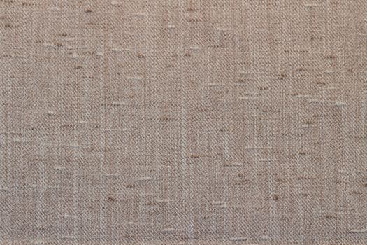 Rustic canvas fabric texture in sand color.