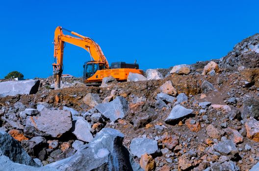 the excavator in a mine in a day's work