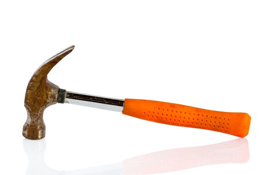    Rusty hammer with a red plastic handle photo on a white background with reflection