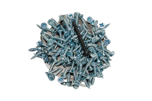 A pile of chrome-plated screws lie on a round magnet isolated against a white background