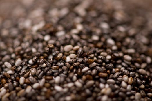 Close-up of raw, unprocessed, dried black chia seeds