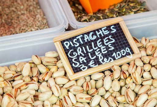 Roasted and salted pistachios ("Pistaches grillees salees" in French) at the food market