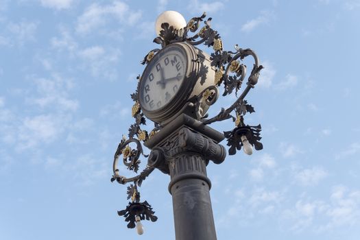 Clock old lamppost in the street, Jerez de la Frontera, Spain