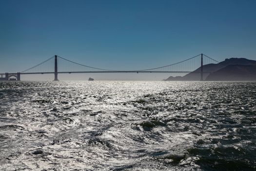 A silhouette of the Golden Gate Bridge