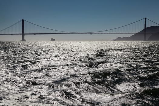 A silhouette of the Golden Gate Bridge