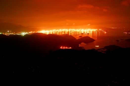 Night scene with mountain and buidings