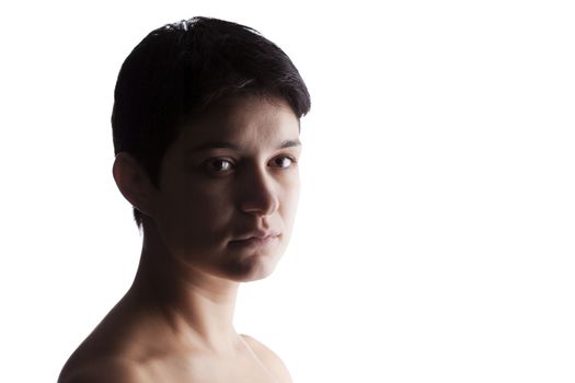 portrait of a girl with a short hair looking at camera, serious expression