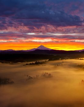 Colorful Sunrise and Rolling Fog over Sandy River Valley