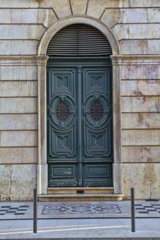 Old door in the city of Lisbon, Portugal