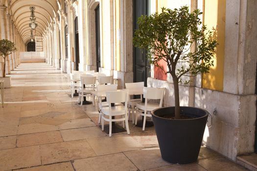 Outdoor street cafe tables in Lisbon