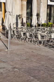 Outdoor street cafe tables in Lisbon