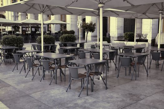 Outdoor street cafe tables in Lisbon