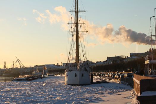 Sailing ship in the ice harbor St. Petersburg winter January