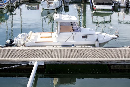 Beautiful white modern yachts at sea port 