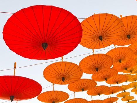 Colorful umbrellas floating on the steeet